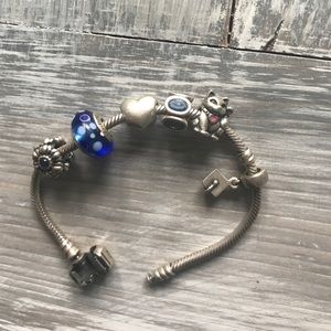 Pandora bracelet included with 6 charms